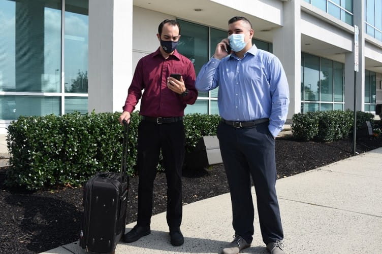 two male business travellers